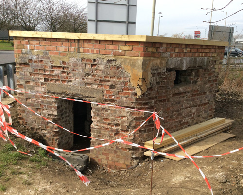 Same Pillbox showing brickwork renovation and installation of new flat roof